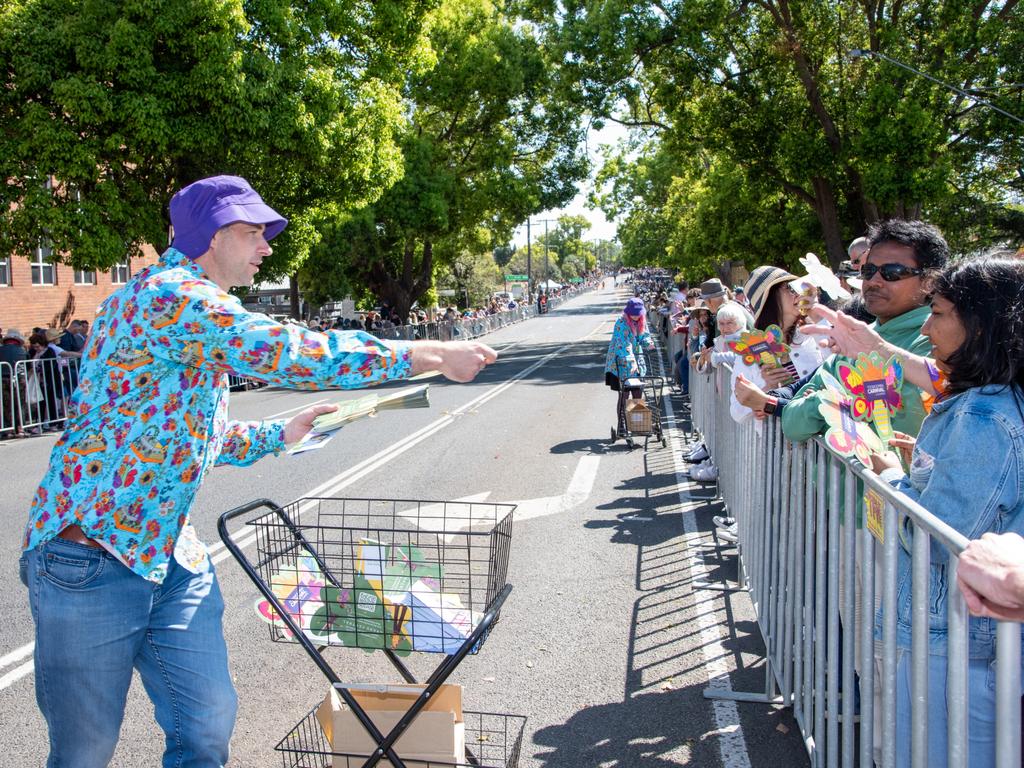 Drew Gatfield handing out Carnival information before the Grand Central Floral Parade. Carnival of FlowersSaturday September 16, 2023