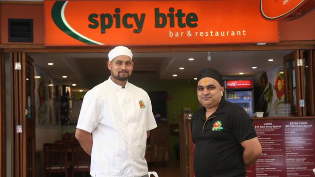 DREAM TEAM: Spicy Bite Bar & Restaurant chef Jatinder Singh (left) and owner Daulat Singh Panwar at their Shields St restaurant. Picture: STEWART MCLEAN