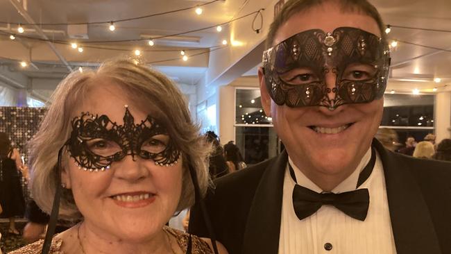 Rae Gate and Carl Blavius celebrate at the Gympie RSL Masked Ball, April 29 2023.