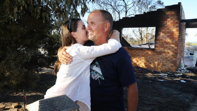 Grant Dowdle with family friend Maddison Tutt at his property on Francis Hellis Drive. Picture: Gary Ramage