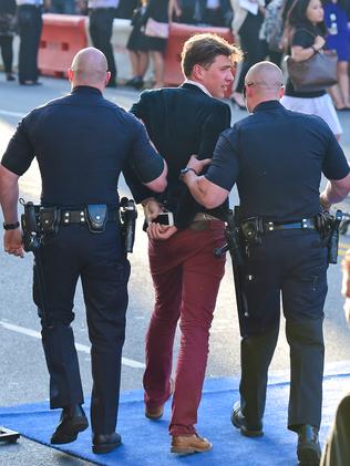The man was quickly taken down by security and apprehended by police.