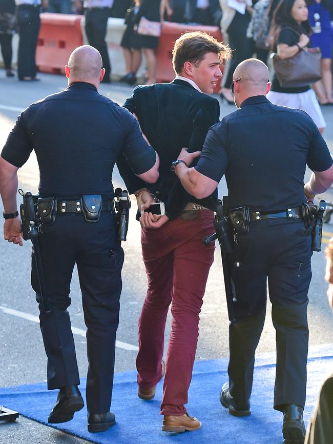 The man was quickly taken down by security and apprehended by police.