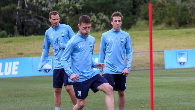 Anton Mlinaric, centre, is another Sydney FC Academy player heading to Brazil.