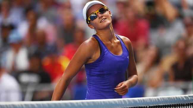 Arina Rodionova could only grin as she was outclassed by Caroline Wozniacki. Picture: AAP
