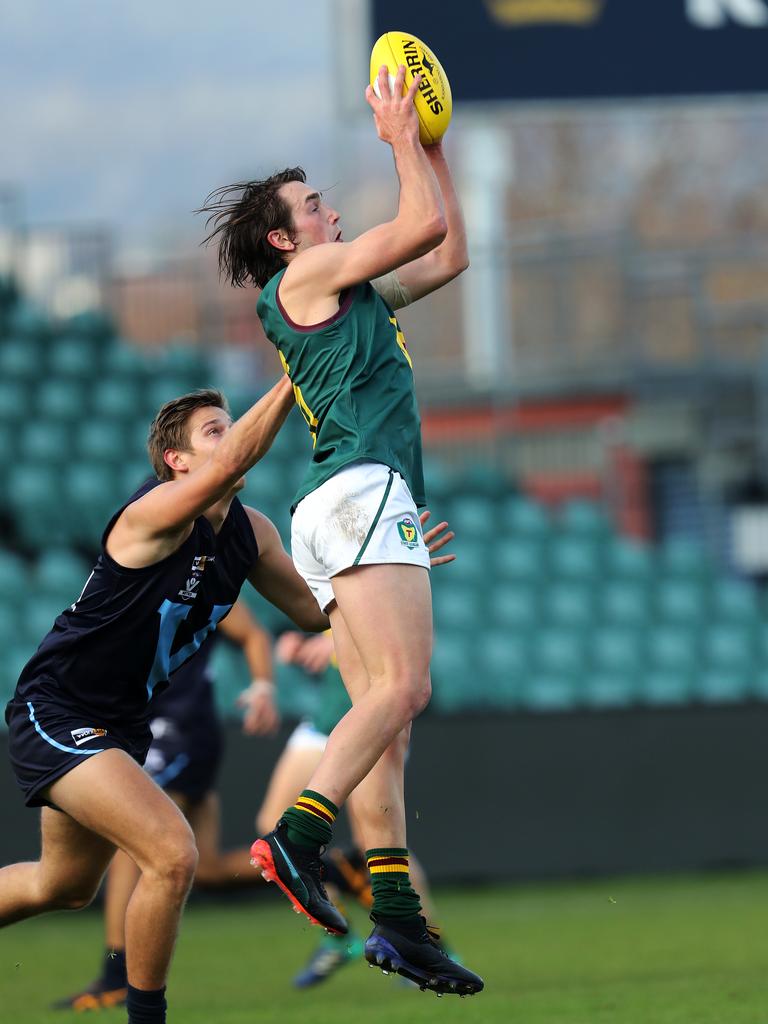 Tasmania Aiden Grace marks during the game against Vic Metro at UTAS Stadium. PICTURE CHRIS KIDD