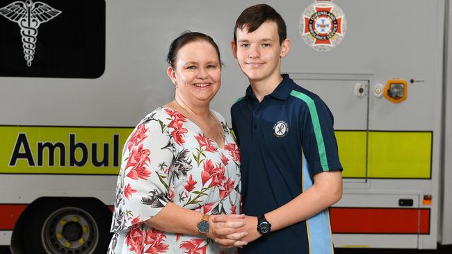 Hudson Hart, 13, has been honoured with an award from Queensland Ambulance Service for his bravery and maturity for calling triple-0 to help his mum, Tegan Hart, who was suffering potentially life threatening Covid-19 symptoms. Picture: Shae Beplate.