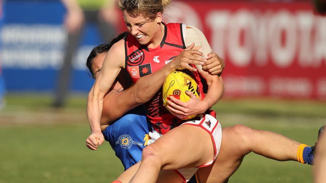 Sophie Van De Heuvel of the Bombers is tackled by Imahra Cameron of the Eagles during last year’s AFLW competition. Photo by Will Russell/AFL Photos via Getty Images