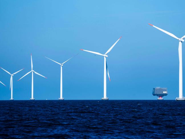 Picture taken on September 4, 2023 shows windmills at the Nysted Offshore Wind Farm constructed by Danish windpower giant Orsted in 2002-2003 in the Baltic Sea near Gedser in Denmark. Long dependent on fossil fuels before emerging a champion of offshore wind power, Danish company Orsted is now struggling to restore its business after a year that saw it drop several major projects. The cancellation of a huge offshore wind farm project in the United States at the end of 2023, accompanied by nearly $4 billion in write-downs, have spotlighted the challenges faced by the Danish group as it seeks to transform. (Photo by Thomas Traasdahl / Ritzau Scanpix / AFP) / Denmark OUT