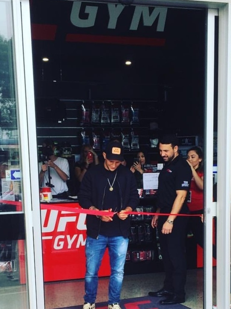 Karim Girgis during his gym’s grand opening in 2018 with UFC fighter TJ Dillashaw.