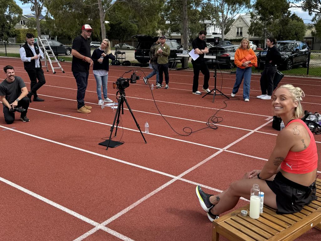 Clay surrounded by cameras on her latest shoot for Voost vitamins.