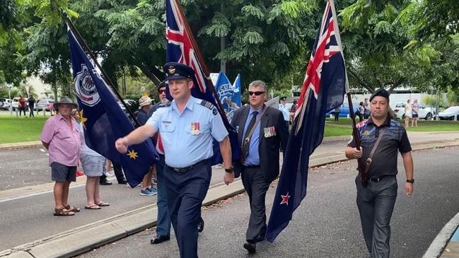 Military personnel take part in the parade.