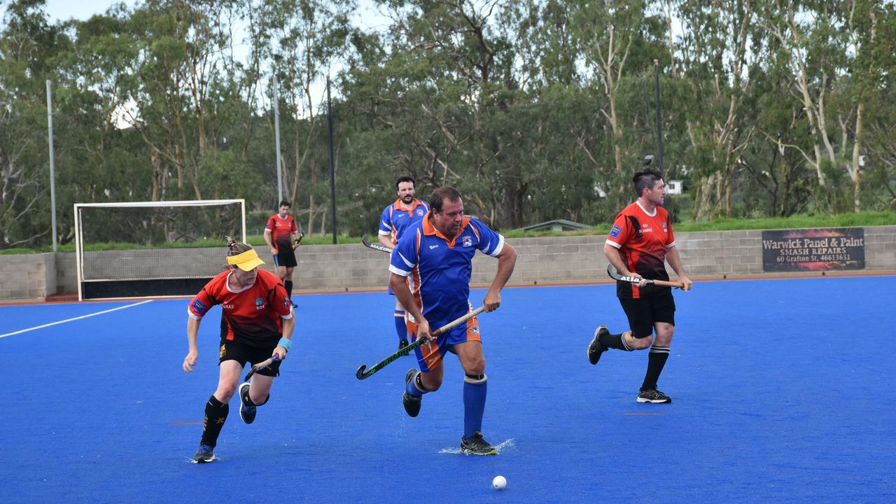 Newtown Tigers defender successfully wins the ball against the Red Schwars.