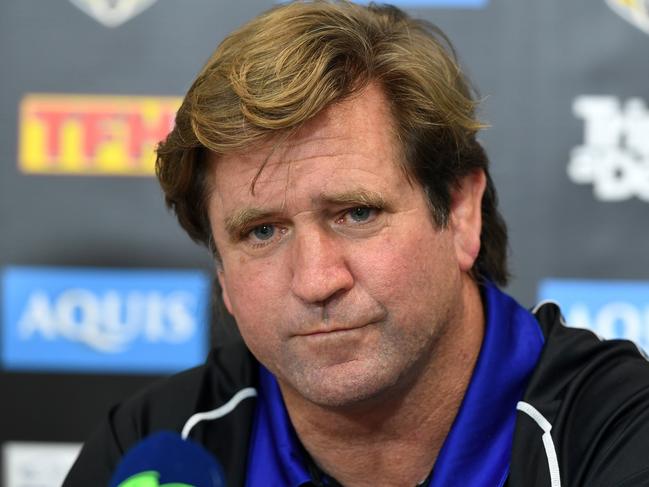 **FILE** A Saturday, August 26, 2017 image reissued Tuesday, September 19, 2017 of Canterbury-Bankstown Bulldogs NRL coach Des Hasler during a press conference following the round 25 NRL match between the Gold Coast Titans and the Canterbury-Bankstown Bulldogs at Cbus Stadium on the Gold Coast. Canterbury have sacked coach Des Hasler from the NRL club. Hasler signed a two-year contract extension with the club in April, but failed to take the team to the finals for the first time since his arrival in 2012. (AAP Image/Dave Hunt) NO ARCHIVING