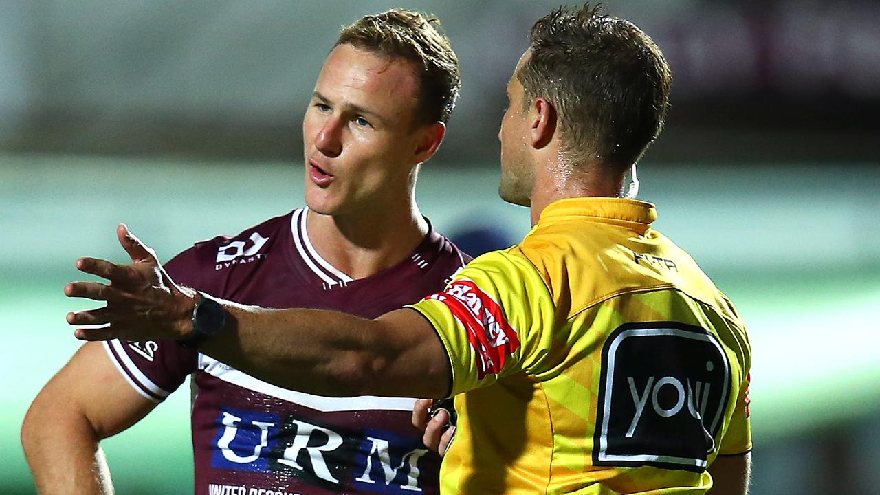 Daly Cherry-Evans of the Sea Eagles speaks with referee Grant Atkins.