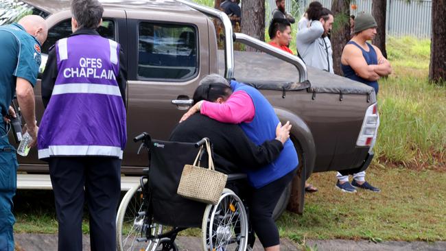 People at the scene of the fire on Sunday. Picture: Steve Pohlner