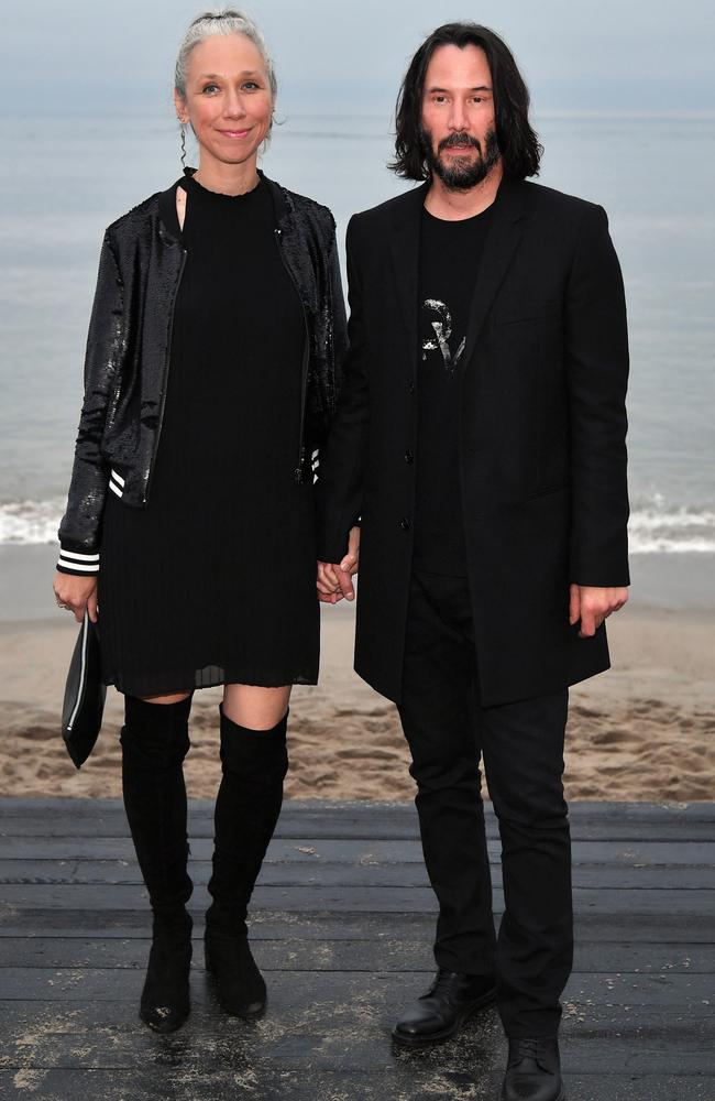 The fashionable pair looked loved-up at a Saint Laurent runway show this year. Picture: Neilson Barnard/Getty Images