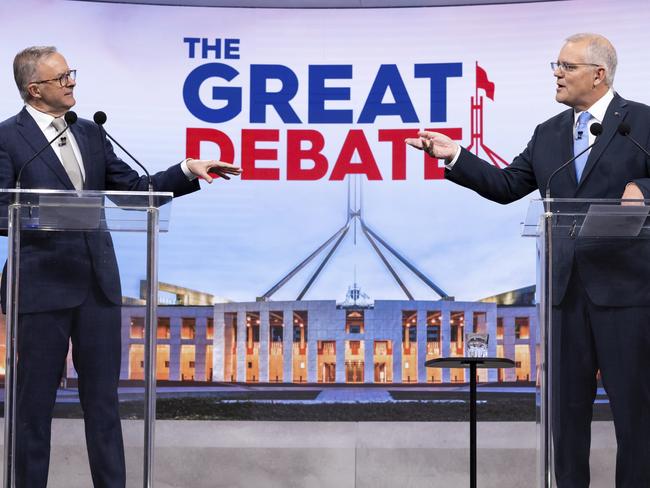 SYDNEY, AUSTRALIA - MAY 08: (L-R) Australian opposition leader Anthony Albanese and Australian Prime Minister Scott Morrison debate on live television ahead of the federal election, during the second leaders' debate of the 2022 federal election campaign at the Nine studio on May 8, 2022 in Sydney, Australia. The Australian federal election will be held on Saturday 21 May with Liberal leader Scott Morrison looking to secure a fourth term in power for the Coalition against Labor and opposition leader Anthony Albanese. (Photo by Alex Ellinghausen - Pool/Getty Images)