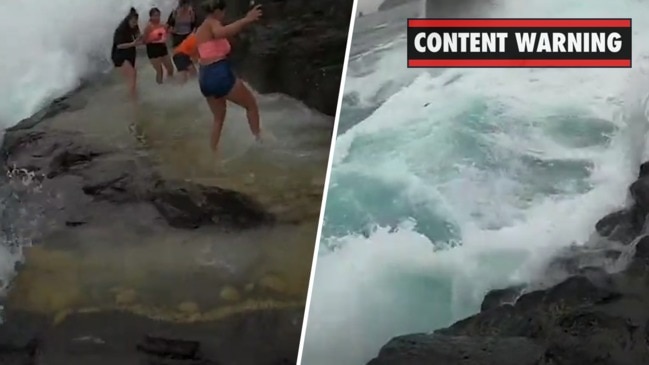 Chilling moment mum swept into sea (7 News)