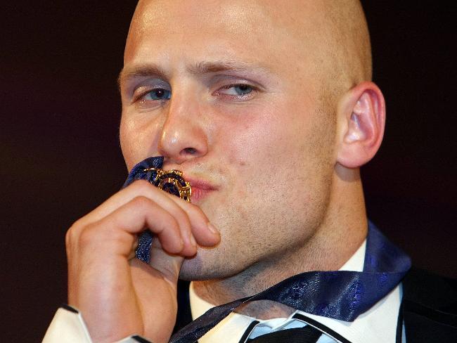 Gary Ablett kisses his Brownlow Medal. Picture: Michael Klein