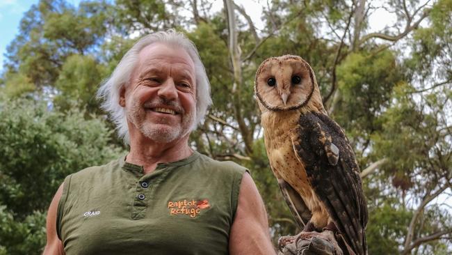 Craig Webb of Raptor Refuge and Montgomery the Tasmanian Masked Owl. He has received an Order of Australia. Picture: supplied