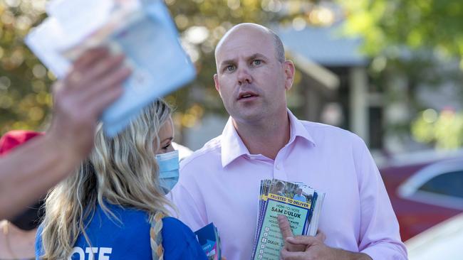 Independent Waite MP Sam Duluk waits in line to vote at the state election on March 19, 2022, at Mitcham Village Uniting Church Hall School. Picture: Naomi Jellicoe