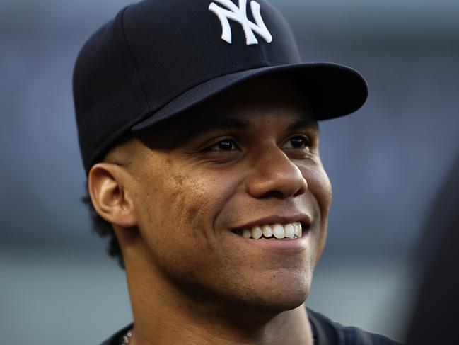 NEW YORK, NEW YORK - JUNE 09: Juan Soto #22 of the New York Yankees looks on in the dugout against the Los Angeles Dodgers during the third inning  at Yankee Stadium on June 09, 2024 in the Bronx borough of New York City. (Photo by Luke Hales/Getty Images)