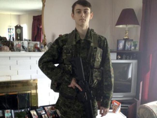 Bryer Schmegelsky wearing army fatigues brandishing a replica machine gun. Picture: Supplied