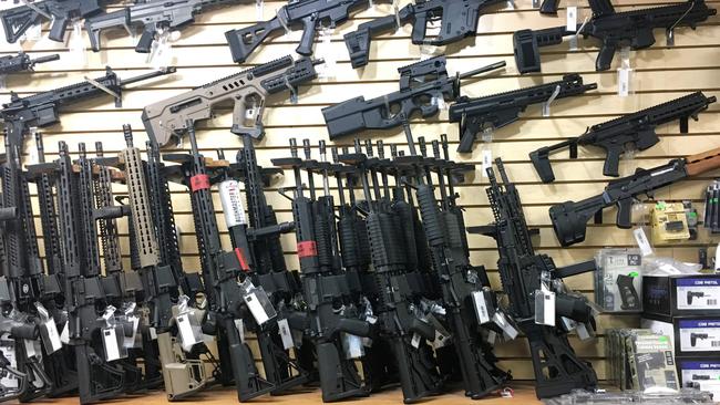 Semi-automatic rifles are seen for sale in a gun shop in Las Vegas, Nevada on October 4.