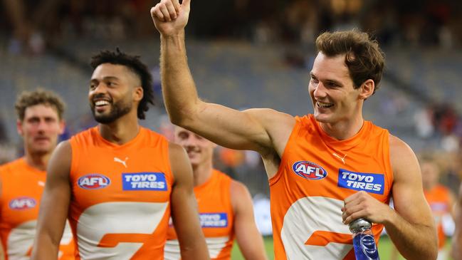 PERTH, AUSTRALIA - MARCH 24: Aaron Cadman of the Giants gives a thumbs up to the crowd after the win during the round two AFL match between West Coast Eagles and Greater Western Sydney Giants at Optus Stadium, on March 24, 2024, in Perth, Australia. (Photo by James Worsfold/AFL Photos/via Getty Images )