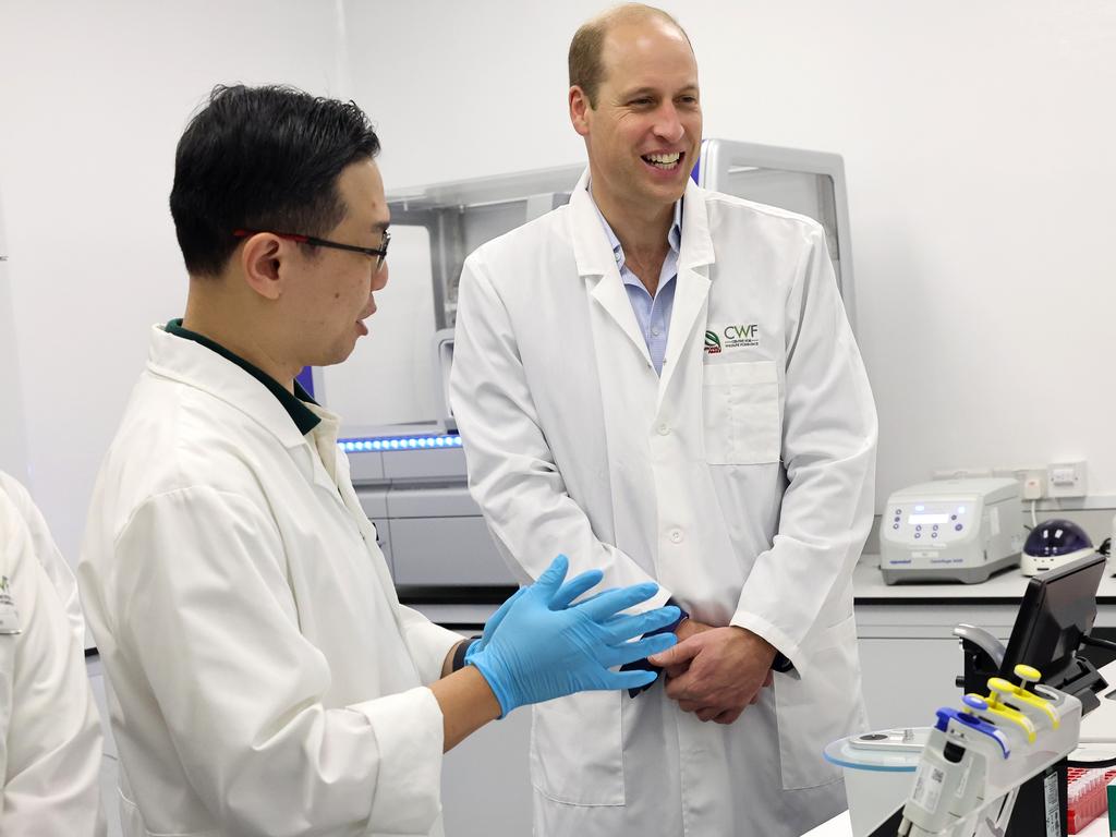 Prince William performs DNA sequencing tests with staff during his visit to the Centre for Wildlife Forensics at Lim Chu Kang. Picture: Getty Images