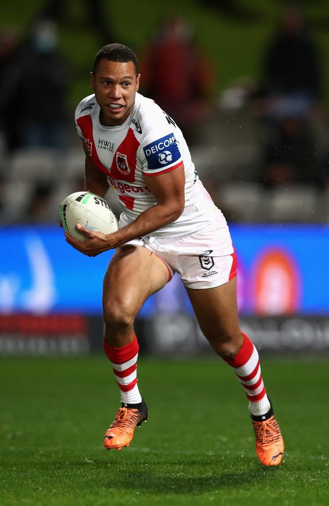 Moses Mbye of the Dragons runs the ball during the round 19 of the NRL. Photo by Jason McCawley/Getty Images