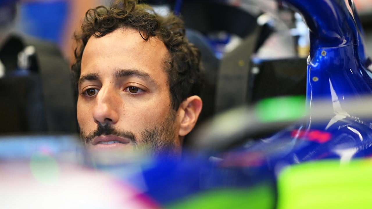 SPIELBERG, AUSTRIA - JUNE 27: Daniel Ricciardo of Australia and Visa Cash App RB has a seat fitting in the garage during previews ahead of the F1 Grand Prix of Austria at Red Bull Ring on June 27, 2024 in Spielberg, Austria. (Photo by Rudy Carezzevoli/Getty Images)