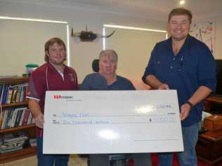 THE GIFT OF GIVING: Trent Knight and Jeff Connolly from the Red Bulls presenting Wayne Finn with $6000 raised from the Kirsten Albeck Rugby 9s memorial day. Picture: Molly Hancock