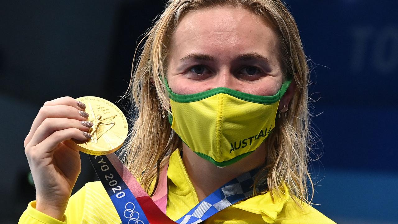 Ariarne Titmus poses with her gold medal after the final of the women's 200m freestyle swimming event. Picture: AFP