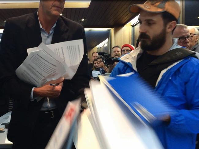 After being spat on, Mr Pearson had his papers knocked from his hands by James McCallum. Picture: Bryant Hevesi