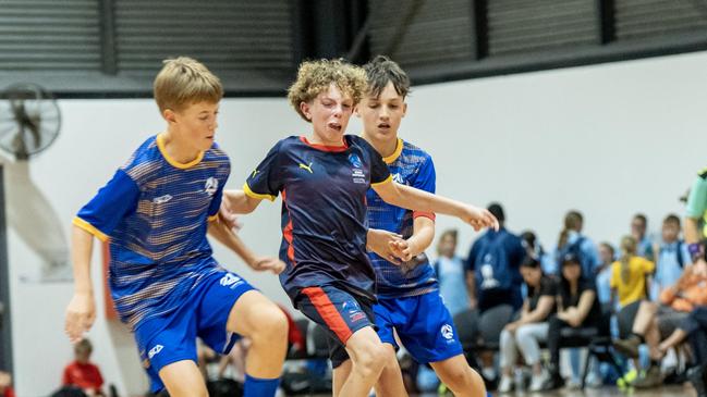 Action from 2025 National Futsal Championships at the State Netball Centre in Melbourne. Picture: Graeme Furlong