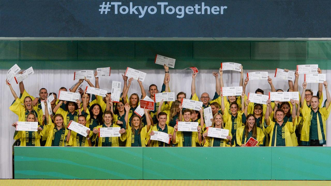 The selected Australian Olympic swimming team poses for photos after the Australian swimming trials in Adelaide.