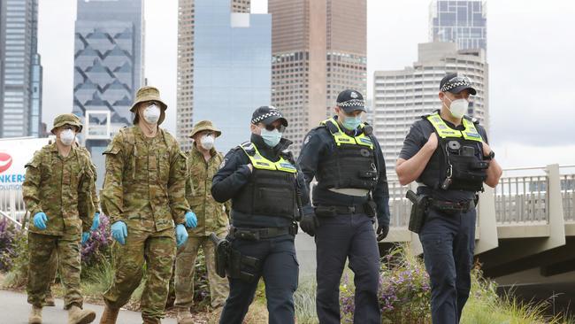 ADF and police patrol along the Yarra to ensure the mandatory mask rule is being followed.: Picture: David Crosling