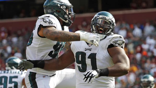 Philadelphia Eagles players celebrate on their way to Monday’s Super Bowl.