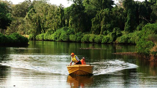 SES volunteers search the Nerang River for Michelle Baggott.