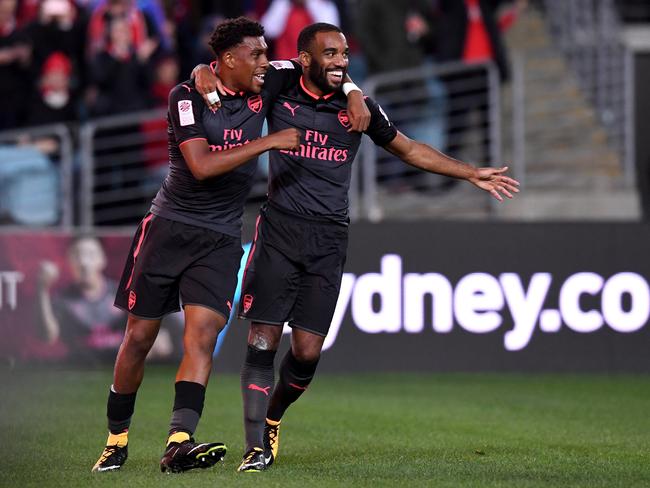 Alexandre Lacazette (right) of Arsenal is congratulated by Alex Iwobi.