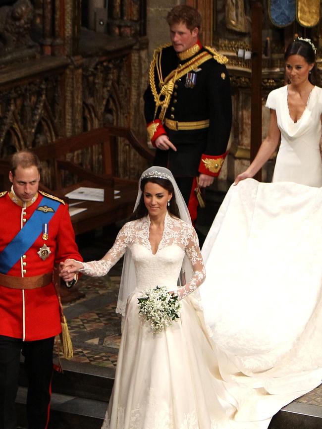 Prince William and Kate, Duchess of Cambridge, at Westminster Abbey with Maid of Honour Pippa Middleton, and best man Prince Harry. Picture: AFP