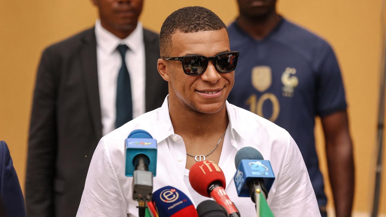 Paris Saint-Germain and France national football team star striker Kylian Mbappe speaks during a press conference in Yaounde on July 7, 2023 during a charity visit and a tour of his father's village. (Photo by Daniel BELOUMOU OLOMO / AFP)