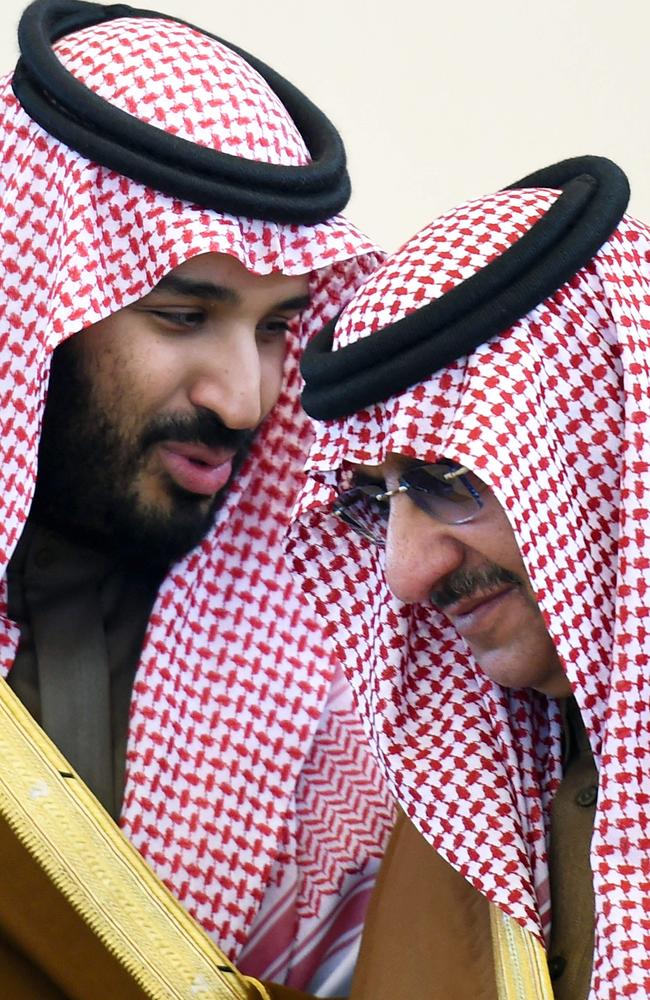 Mohamed bin Salman, left, talks with Crown Prince and  Mohammed bin Nayef.