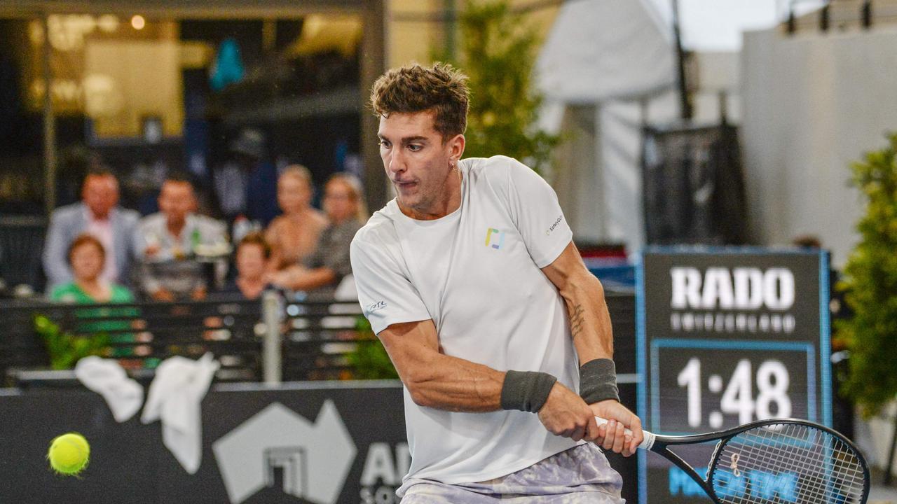 Thanasi Kokkinakis of Australia hits a return against Arthur Rinderknech of France in the men's singles final match at Adelaide International ATP 250 tennis tournament in Adelaide on January 15, 2022. (Photo by Brenton Edwards / AFP)