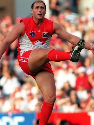 Tony Lockett kicks for goal in his AFL return. Picture. Phil Hillyard