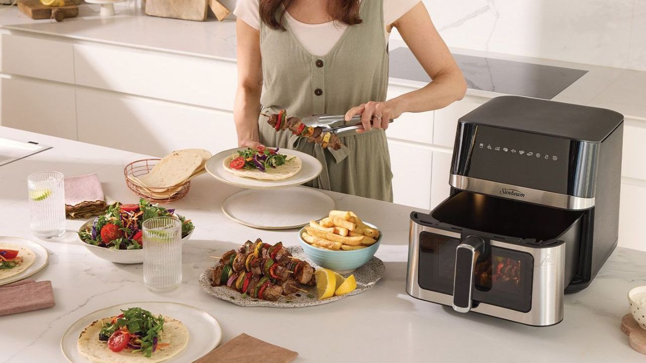 This five-star Sunbeam appliance made our Health and Wellness Writer an "air fryer convert". Picture: Sunbeam.