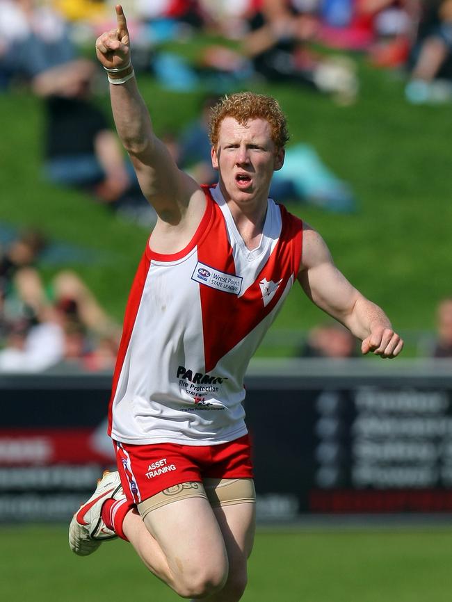 Green celebrates a goal in the 2009 TSL grand final.