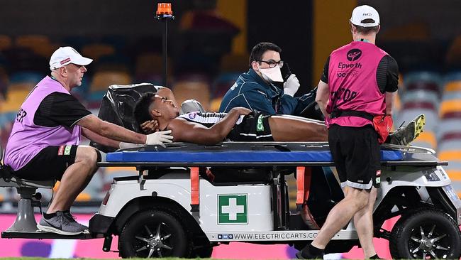 Isaac Quaynor had to be stretchered from the ground after suffering a serious gash in his leg. Picture: Getty Images