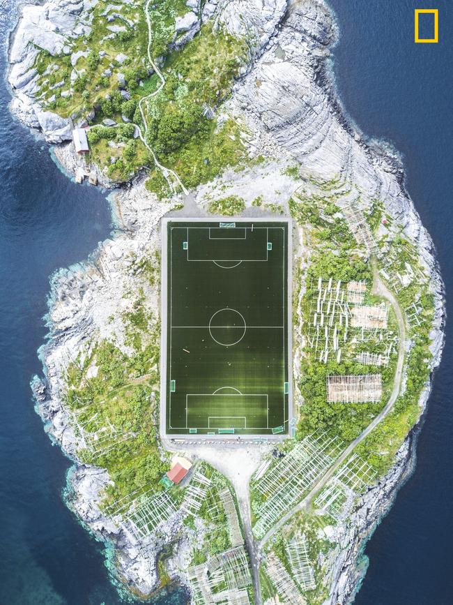Henningsver Football Field This football field in Henningsvær in the Lofoten Islands is considered one of the most amazing fields in Europe, and maybe even in the world. The photo was taken during a 10-day sailing trip in Norway in June 2017. We arrived to Henningsvær after a week of sailing through the cold and rainy weather. Upon our arrival, the weather cleared up. I was really lucky that the conditions were suitable for flying my drone, and I managed to capture this shot from a height of 120 meters. Picture: Misha De-Stroyev / National Geographic Travel Photographer of the Year